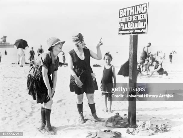 Two Women reading Sign on Beach, Lincoln, Park, Chicago, Illinois, USA, American National Red Cross Collection, 1919.