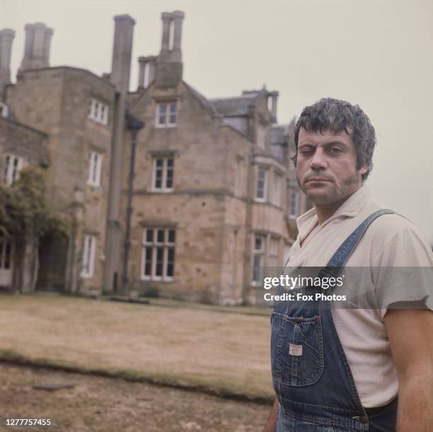 English actor Oliver Reed outside Broome Hall, his country mansion in Surrey, UK, 3rd December 1971.