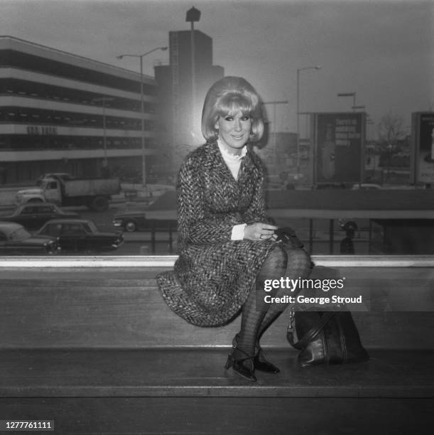 English pop singer Dusty Springfield at London Airport, UK, 22nd March 1966.