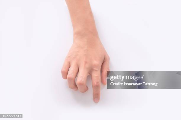 woman using computer mouse on white background - daumen drücken stock-fotos und bilder