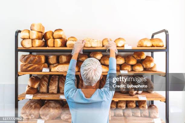 Person Reaching Back View Photos and Premium High Res Pictures - Getty ...