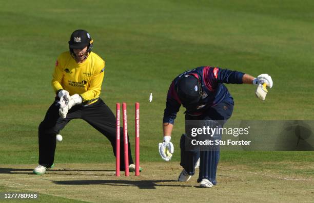 Northants batsman Richard Levi is bowled by Graeme van Buuren as James Bracey celebrates during the T20 Vitality Blast Quarter Final match between...