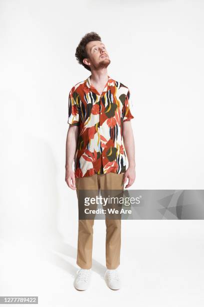 portrait of man looking up - looking up stock pictures, royalty-free photos & images