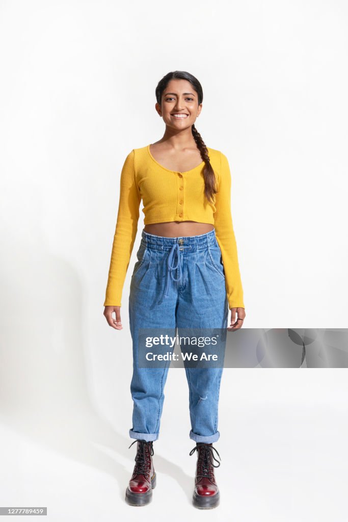 Full length portrait of smiling woman