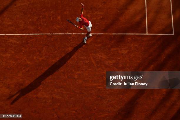 Dusan Lajovic of Serbia plays a forehand during his Men's Singles second round match against Kevin Anderson of South Africa on day five of the 2020...