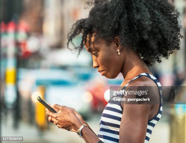 checking phone notifications - using screen reader stock pictures, royalty-free photos & images