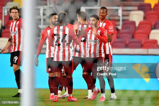 Said Benrahma of Brentford celebrates with his team mates after scoring his team's second goal during the Carabao Cup fourth round match between...