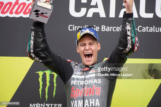 Fabio Quartararo of France and Petronas Yamaha SRT celebrates the victory on the podium at the end of the MotoGP race during the MotoGP of Catalunya:...