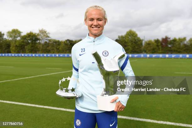 Pernille Harder of Chelsea poses for a photo with her UEFA Women's Player of the Year Award and her UEFA Women's Forward of the Year Award at Chelsea...