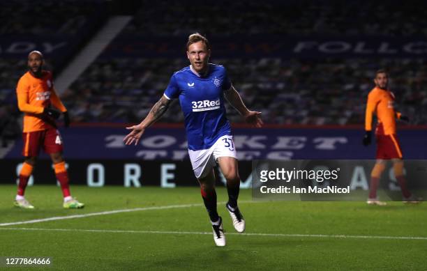 Scott Arfield of Rangers celebrates after scoring his team's first goal during the UEFA Europa League play-off match between Rangers and Galatasaray...