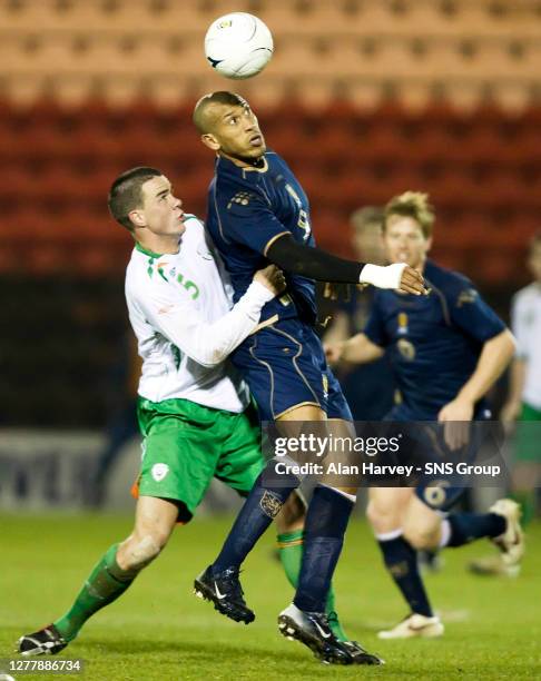 V REPUBLIC OF IRELAND B .NEW BROOMFIELD - AIRDRIE.Scotland debutant Chris Iwelumo gets to the ball ahead of Graham Gartland