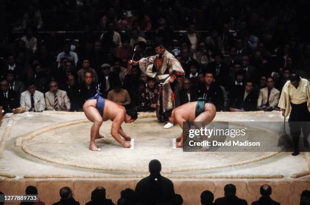 General view of a sumo wrestling match during the 1983 Kyushu Basho sumo wrestling tournament held in November 1983 at the Fukuoka Kokusai Center in...