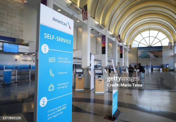 Am Check In American Airlines Check In Photos and Premium High Res Pictures - Getty ...