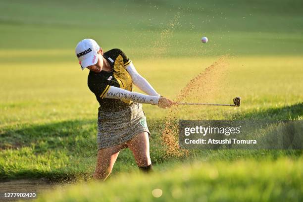 Kana Nagai of Japan hits out from a bunker on the 10th hole during the second round of the Japan Women's Open Golf Championship at the Classic Golf...