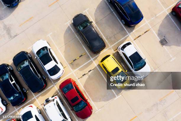 outdoor parking lot in the city center - estacionar imagens e fotografias de stock