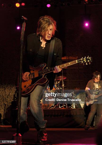 Singer/songwriter/guitarist John Rzeznik, drummer Mike Malinin and singer/songwriter/bass guitarist Robby Takac of the Goo Goo Dolls performs at the...