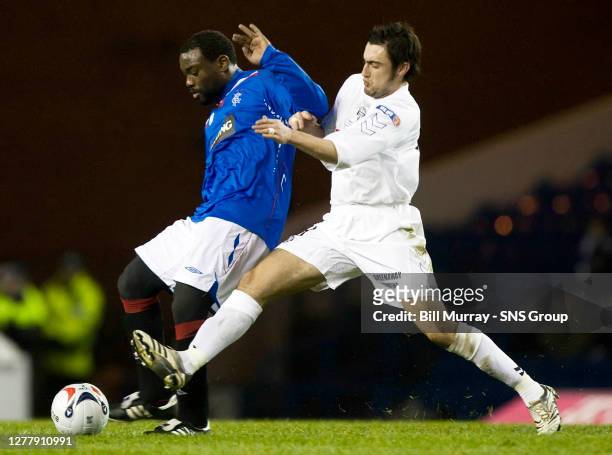 Jean Claude Darcheville and East Stirling's Gary Kelly clash in the Scottish Cup fourth round
