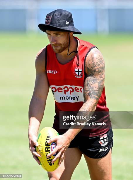 Dean Kent lines up a kick during a St Kilda Saints AFL training session at the Noosa Tigers Football Club on October 02, 2020 in Sunshine Coast,...
