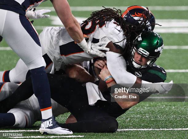 Johnson of the Denver Broncos sacks Sam Darnold of the New York Jets during the third quarter at MetLife Stadium on October 01, 2020 in East...