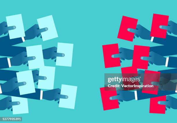 illustrations, cliparts, dessins animés et icônes de deux groupes de mains retenant des bulletins de vote de différentes couleurs - voter