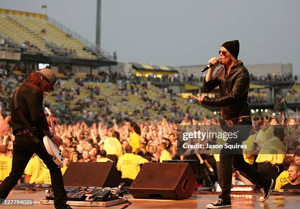 Musician Paul Phillips and singer/musician Wes Scantlin of Puddle of Mudd perform during the 2011 Rock On The Range festival at Crew Stadium on May...