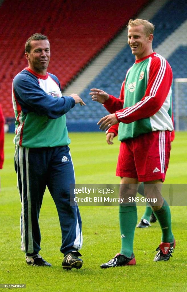 17/08/04.Hungary Training.Hampden - Glasgow.Head Coach Lothar Matthaus (Left) Shares A Joke With Sandor Torghelle