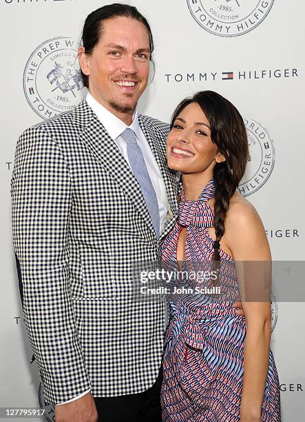 Steve Howey and Sarah Shahi arrive for Tommy Hilfiger and Lisa Birnbach Celebration of Prep World on June 9, 2011 in Los Angeles, California.