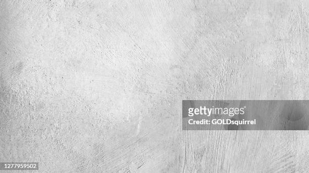 attractive modern raw and uneven concrete wall surface - handmade gray texture with visible natural imprints, texture and structure of mortar - vector stock illustration - indoors stock illustrations