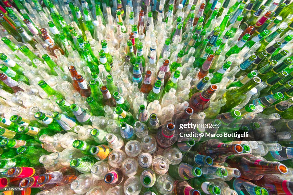 Large group of empty glass bottles