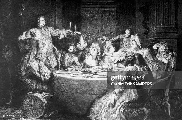 Aristocratic guests drinking champagne at dinner, while living under the Regency in the XVIIIth century, in France. Pendant un repas sous la Régence...