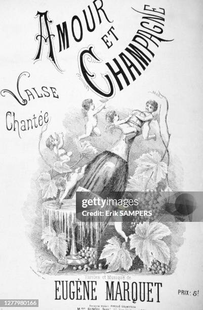 Cover of a brochure containing the lyrics and score of the song AMOUR ET CHAMPAGNE, written by Eugene MARQUET. On the engraving, angels holding a...