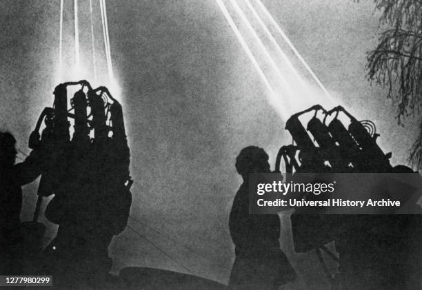 Searchlight operators preparing for a night bombing raid, Moscow, 1941. The Luftwaffe launched its first air raid on Moscow on 22 July 1941....