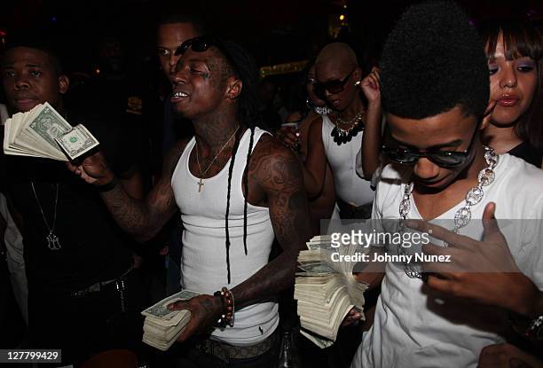 Rappers Lil Wayne and Lil Twist attend Worldstarhiphop 6 Year Anniversary at King of Diamonds on May 27, 2011 in Miami, Florida.