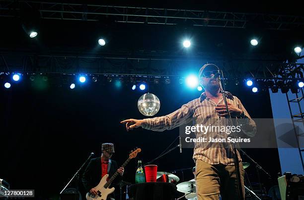Singer/musician John McCrea and singer/musician Gabe Nelson of Cake perform at the 2011 Buzz Under The Stars concert at City Market on June 3, 2011...