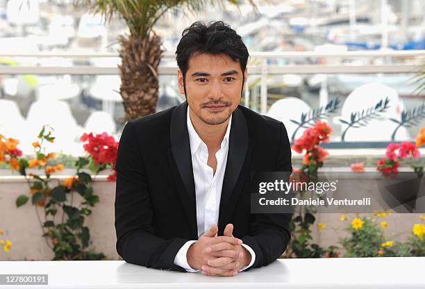 Actor Takeshi Kaneshiro attends the "Wu Xia" Photocall during the 64th Annual Cannes Film Festival at Palais des Festivals on May 14, 2011 in Cannes,...
