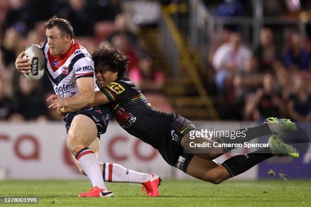 Brett Morris of the Roosters is tackled Jarome Luai of the Panthers during the NRL Qualifying Final match between the Penrith Panthers and the Sydney...