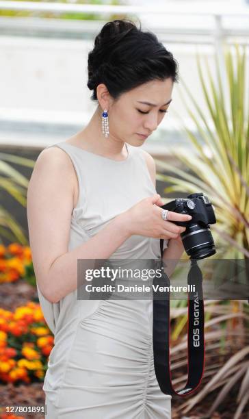 Actress Li Xiao Ran attends the "Wu Xia" Photocall during the 64th Annual Cannes Film Festival at Palais des Festivals on May 14, 2011 in Cannes,...