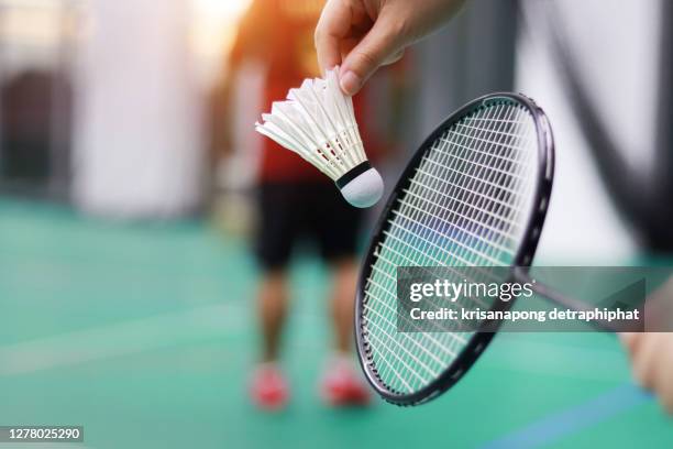 men playing badminton,exercise,badminton - badminton stock pictures, royalty-free photos & images