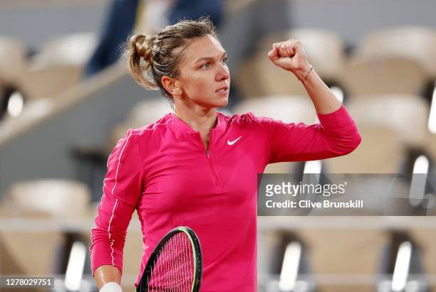 Simona Halep of Romania celebrates after winning a point during her Women's Singles third round match against Amanda Anisimova of The United States...