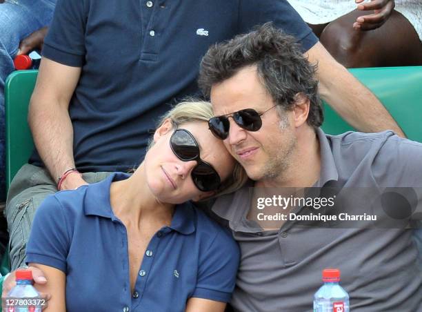 Anne-Sophie Lapix and her husband Arthur Sadoun attend the French open at Roland Garros on June 4, 2011 in Paris, France.