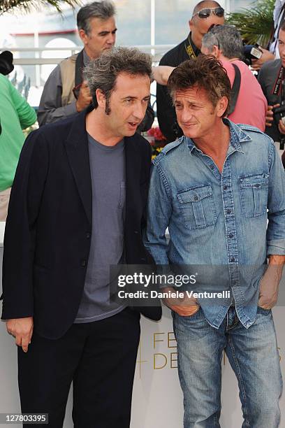 Director Paolo Sorrentino and actor Sean Penn attends the "This Must Be The Place" Photocall during the 64th Cannes Film Festival at the Palais des...