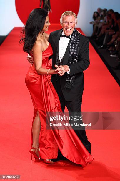 Bruce Forsyth and Wilnelia Merced attend the " Fashion For Relief Japan Fundraiser" during the 64th Annual Cannes Film at Forville Market on May 16,...