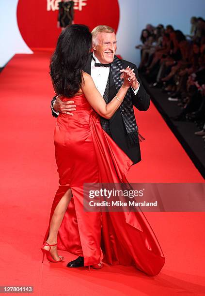 Bruce Forsyth and Wilnelia Merced attend the " Fashion For Relief Japan Fundraiser" during the 64th Annual Cannes Film at Forville Market on May 16,...