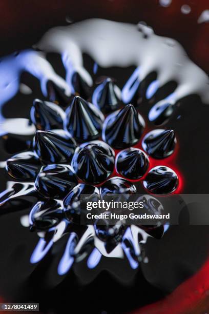 macro close-up of ferrofluid. - ferrofluid stock pictures, royalty-free photos & images