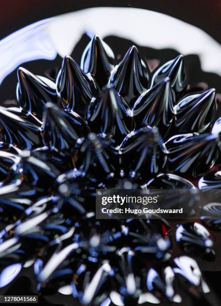 macro close-up of ferrofluid. - ferrofluid stock pictures, royalty-free photos & images