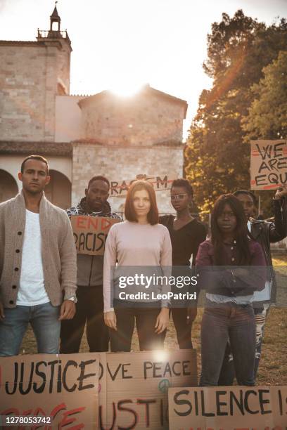 group of people together to say no to racism - racism concept stock pictures, royalty-free photos & images