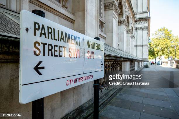 parliament street and whitehall street sign - politics and government imagens e fotografias de stock