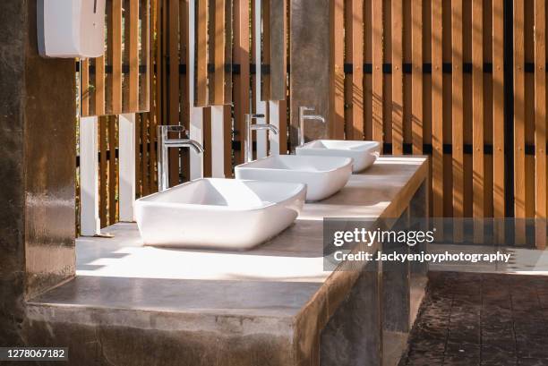 faucet in public restroom - hotel poland stock pictures, royalty-free photos & images