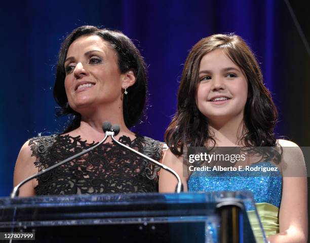 Jenni Pulos and Starlight StarPower Spokesperson Bailee Madison speak onstage at the Starlight Children's Foundation 2011 "A Stellar Night" Gala at...