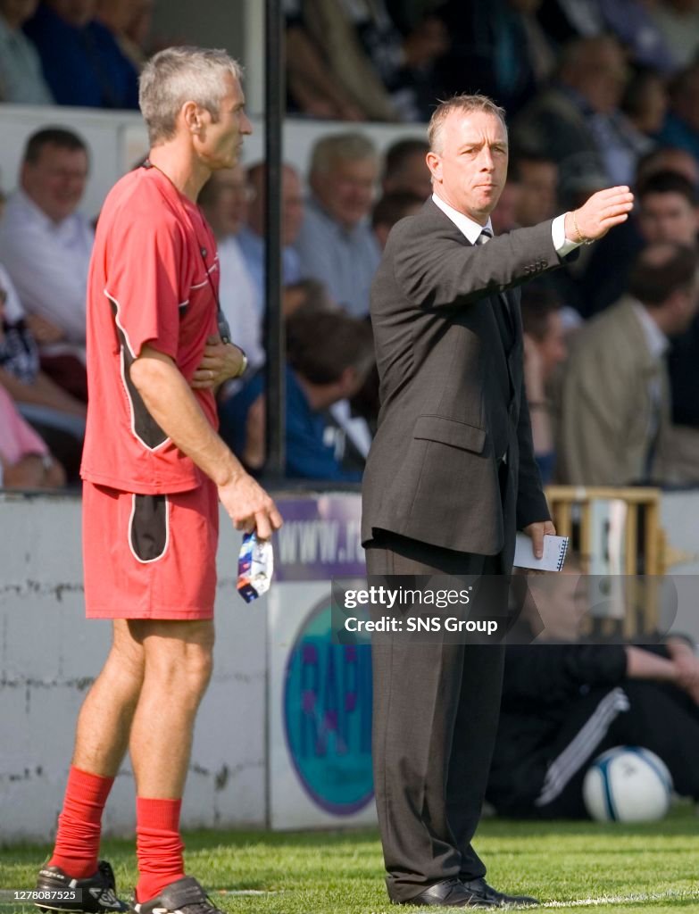 16/09/06 Sfl Div1.Gretna V Livingston (1-1).Raydale Park - Gretna .Gretna Assistant David Irons (Left) Looks On As Manager Rowan Alexander Gives Orders From The Touchline.